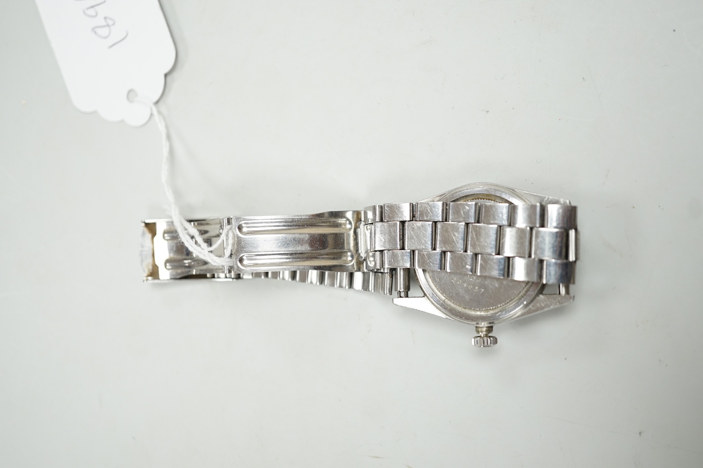 A gentleman's late 1950's? stainless steel Tudor Oysterdate manual wind wrist watch with black honeycomb dial, on associated stainless steel bracelet, case diameter 34mm, the case back numbered 7929 over 204837, no box o